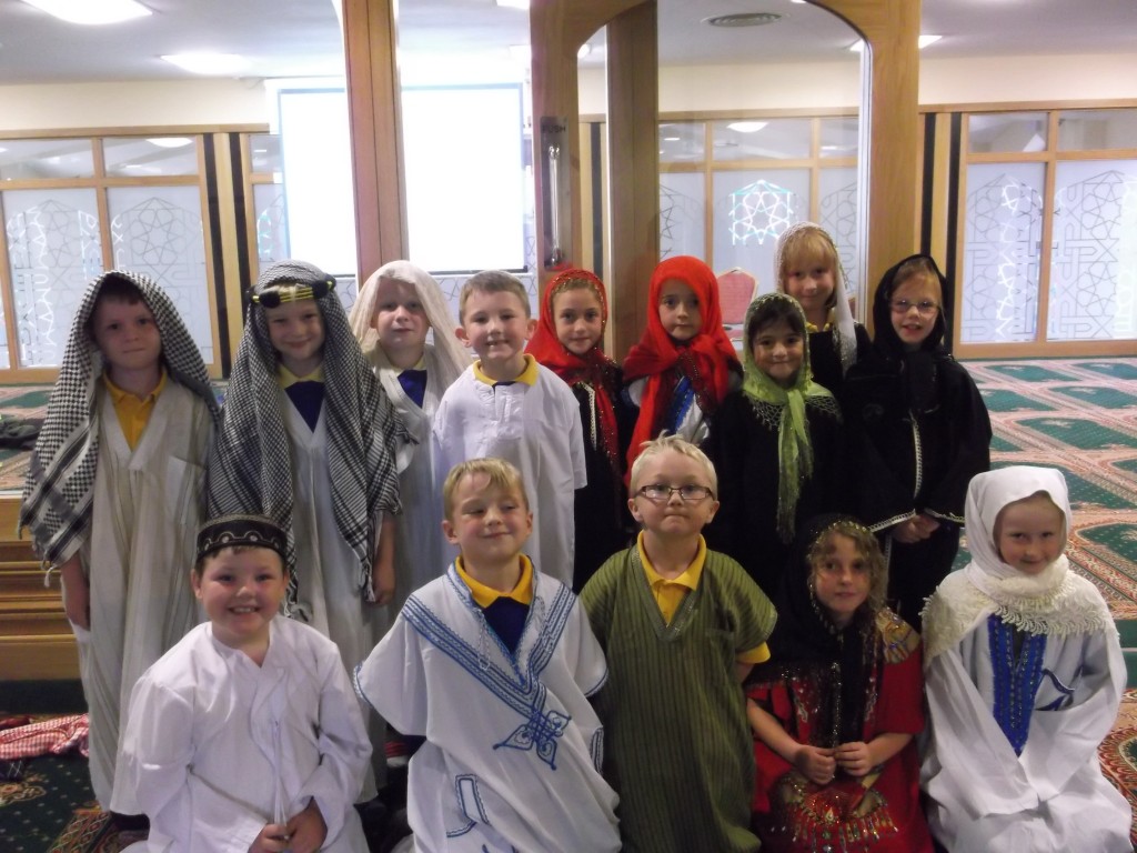 School children in traditional dress during a visit to the mosque